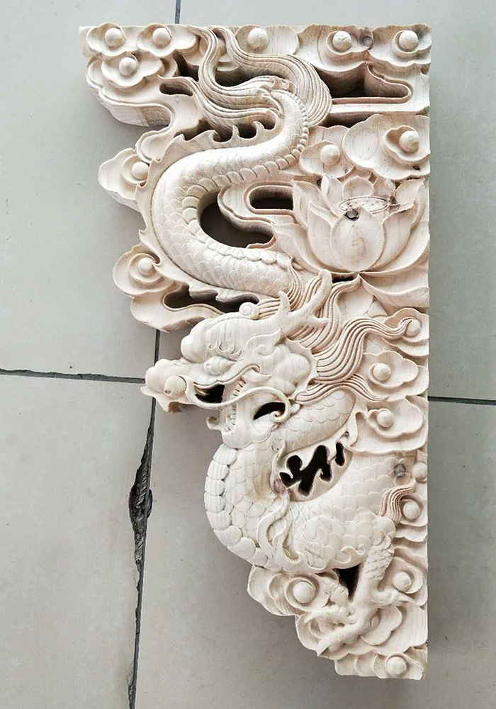 ţ